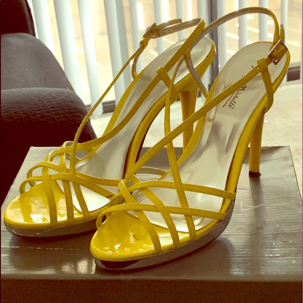 Yellow and silver high heels